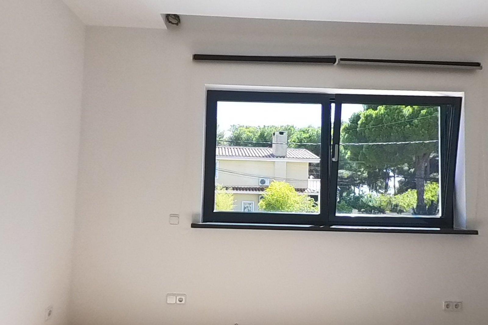 Dormitorio doble con ventanal